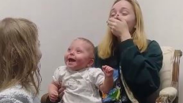 Baby gets first hearing aids, giggles uncontrollably